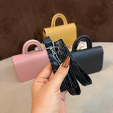 کیف دستی دخترانه پاسپورتی دسته دار مینیمال